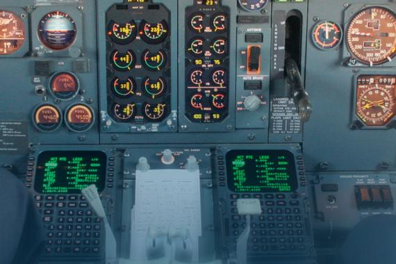 A view of the controls and instruments in an airplane's cockpit